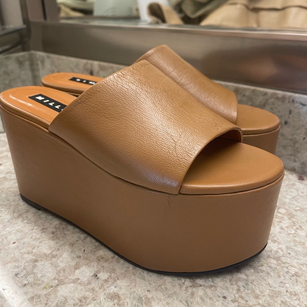 Worn once Size 11 wedge Neiman’s Miller wedge. Toffee color. $525 if new.